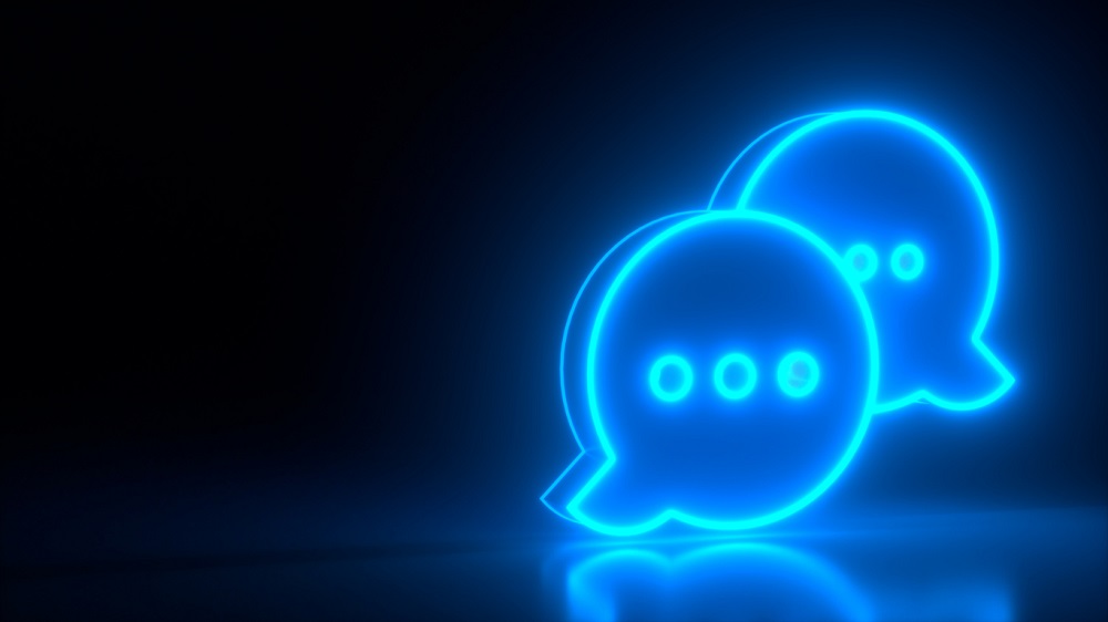 Futuristic glowing blue neon dialog symbol on black dark background with blurred reflection. Chat icon, chat logo template. Comment sign symbol. Luminous style. 3d rendering