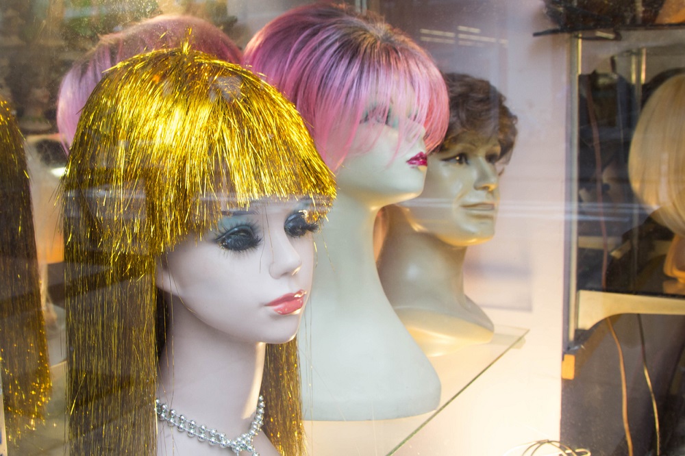 Pensive mannequin heads with wigs